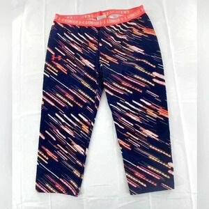Under Armour youth x-large orange compression style heat gear capri leggings